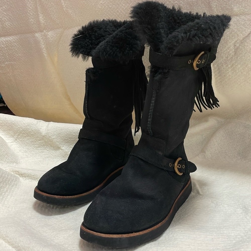 Ugg black asymmetrical fringe boots w brass hardware, winter